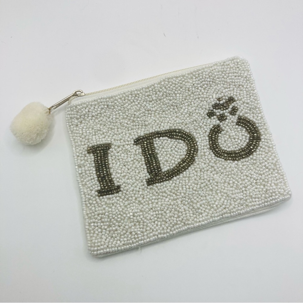Shirdee white and silver “I do” beaded zippered pouch with pom.